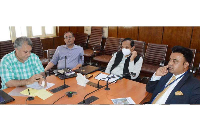 page3-2 Advisor R R Bhatnagar at a meeting in Srinagar on Monday.