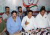 PCC chief spokesperson Ravinder Sharma, flanked by senior party leaders, addressing press conference in Jammu. -Excelsior/Rakesh