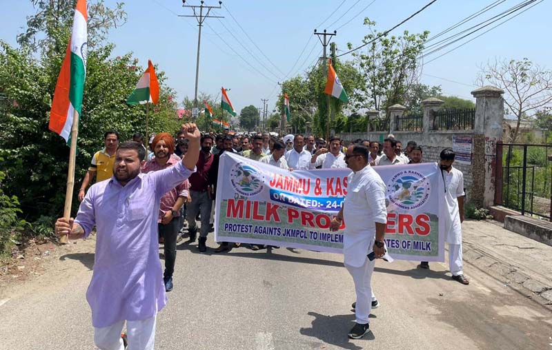 Dairy farmers raising slogans during protest at Jammu.