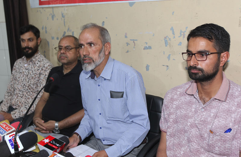 Contractual college teachers addressing a press conference at Jammu on Sunday. Contractual college teachers addressing a press conference at Jammu on Sunday.