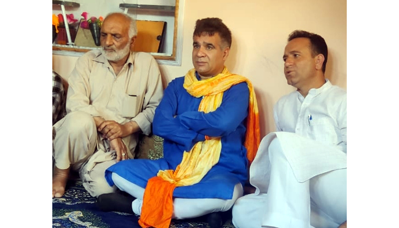 BJP leaders with father of actress Amreen Bhat who was killed by militants recently in Badgam.