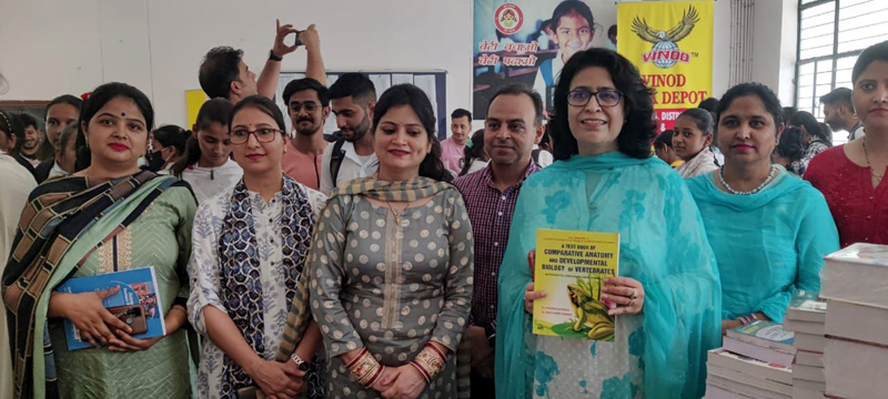 Principal and others at book club in Hiranagar Degree College. Principal and others at book club in Hiranagar Degree College.