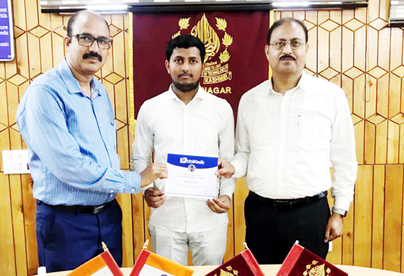 Tabrez Alam, an IT student of NIT Srinagar posing with Director and Registrar of the Institute. Tabrez Alam, an IT student of NIT Srinagar posing with Director and Registrar of the Institute.