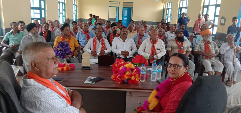 Senior BJP leader and former Minister, Ch. Sukhnandan addressing a meeting at Haripur on Wednesday.