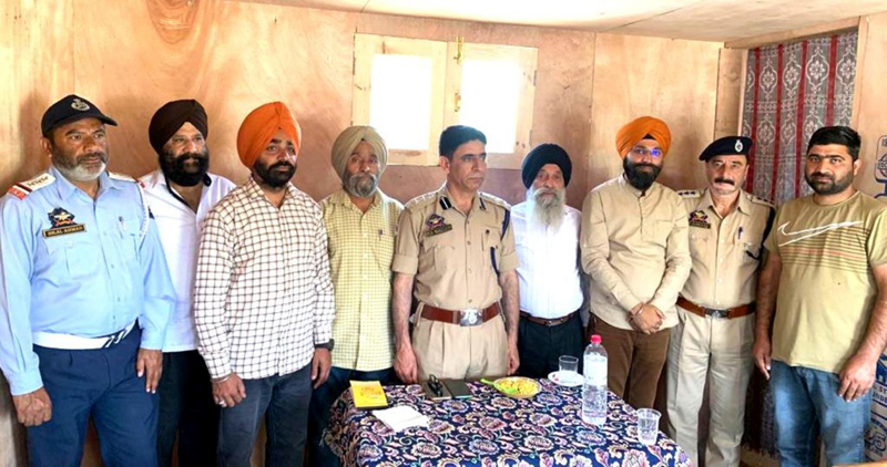 Members of J&K Oil and LPG Tank Drivers & Cleaners Union posing for a photograph with SSP Traffic Rural Kashmir. Members of J&K Oil and LPG Tank Drivers & Cleaners Union posing for a photograph with SSP Traffic Rural Kashmir.