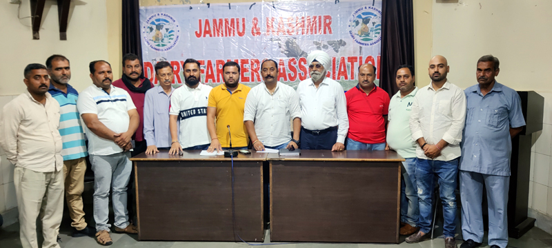 Office bearers of J&K Dairy Farmers Association posing for a group photograph after a press conference. Office bearers of J&K Dairy Farmers Association posing for a group photograph after a press conference.