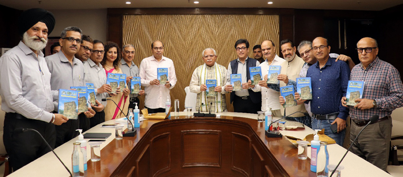 CM Manohar Lal launching a book authored by Vishwakarma Skill University, Vice Chancellor, Raj Nehru along with other dignitaries at Gurugram on Monday. CM Manohar Lal launching a book authored by Vishwakarma Skill University, Vice Chancellor, Raj Nehru along with other dignitaries at Gurugram on Monday.