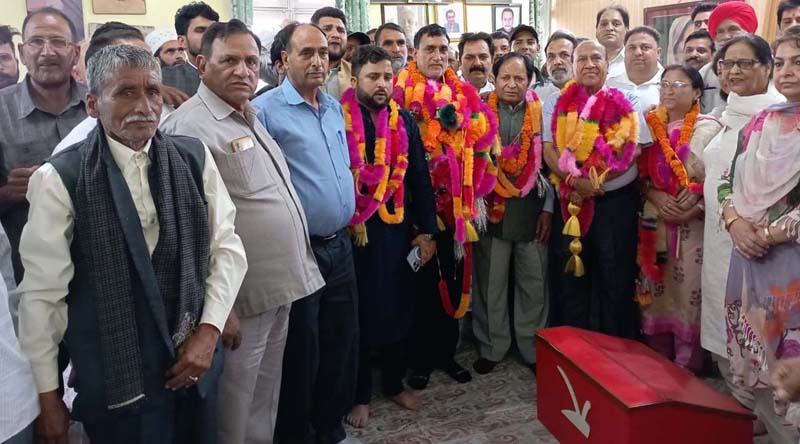 NC provincial president for Jammu Rattan Lal Gupta and other party leaders during a function at Sher-e-Kashmir Bhawan, Jammu.