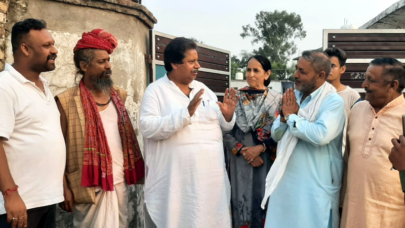 JKPCC working president Raman Bhalla during door to door campaign at Rajiv Nagar, Jammu. JKPCC working president Raman Bhalla during door to door campaign at Rajiv Nagar, Jammu.