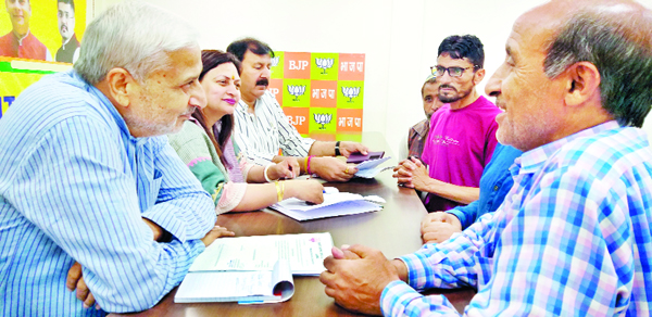 BJP leaders listening public grievances at party office, Trikuta Nagar on Thursday. BJP leaders listening public grievances at party office, Trikuta Nagar on Thursday.