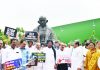 Opposition MPs protesting infront of the Mahatma Gandhi statue at Parliament during the Monsoon Session in New Delhi on Wednesday. (UNI)