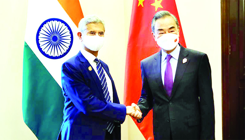 Foreign Minister S Jaishankar with Chinese Foreign Minister Wang Yi during their bilateral meeting ahead of the G20 Foreign Ministers meeting in Nusa Dua, Bali, Indonesia on Thursday (UNI)