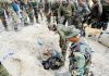 Hi tech equipment being used by Army alongside dogs and manual efforts of the jawans in the cave area to clear the rubble and locate the missing persons. — Excelsior/Abid Nabi