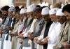 People offer Eid prayers at Hazratbal shrine in Srinagar on Sunday. — Excelsior/Shakeel