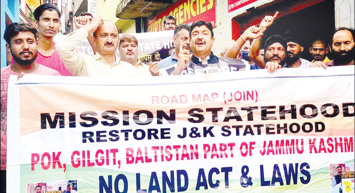 Leaders & activists of Mission Statehood staging protest at Jammu on Saturday. Leaders & activists of Mission Statehood staging protest at Jammu on Saturday.