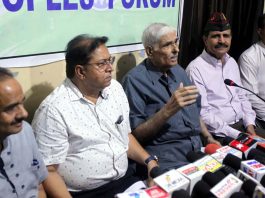 JKPF president Ramesh Sabharwal and other members during a press conference at Jammu on Friday. -Excelsior/Rakesh