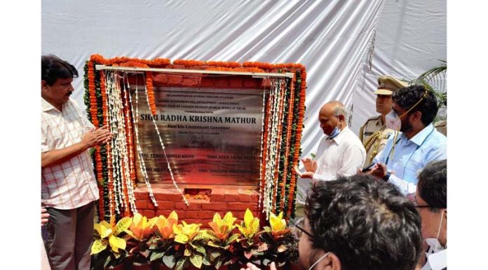 Lieutenant Governor of Ladakh R K Mathur laying foundation stone of Ladakh Bhavan at Dwarka in Delhi on Sunday.