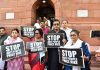 Suspended Rajya Sabha MPs staging a protest at Parliament House during the Monsoon session in New Delhi on Tuesday. (UNI)