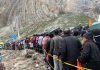 Heavy rush of pilgrims near cave shrine area for darshan on Monday.