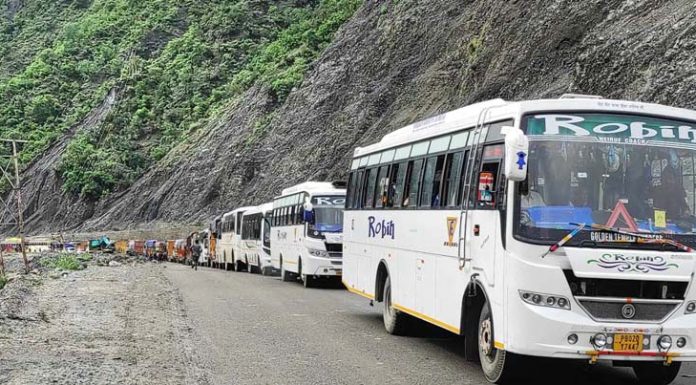 Stranded vehicles on Jammu-Srinagar National Highway which remained closed on Thursday. -Excelsior/Parvaiz Mir