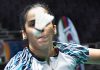 Saina Nehwal hits a return during the women's singles round of 16 match against China's He Bingjiao in Singapore Open 2022 badminton tournament in Singapore on Thursday. (UNI)