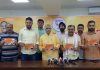 BJP general secretary (Org), Ashok Koul and ex MLC Vikram Randhawa releasing a book at party office on Thursday.