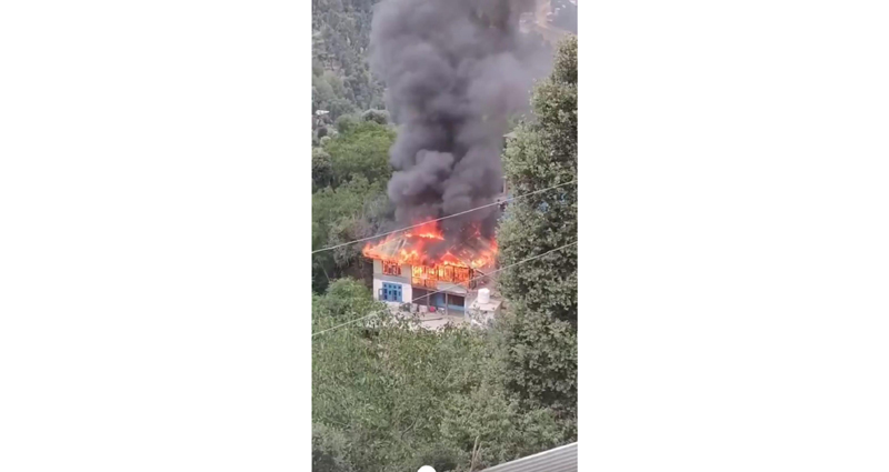 A house on fire. -Excelsior/Tilak Raj A house on fire. -Excelsior/Tilak Raj