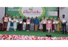 The chief guest along with others posing for a group photograph during valedictory ceremony of Ayurveda Parv at Jammu.