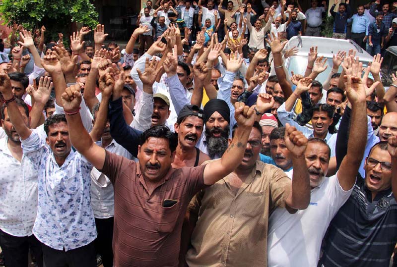 PHE workers staging protest demonstration at BC Road office of Chief Engineer in Jammu on Tuesday. -Excelsior/Rakesh PHE workers staging protest demonstration at BC Road office of Chief Engineer in Jammu on Tuesday. -Excelsior/Rakesh