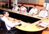 Mahamandleshwar chairing a meeting of SMVD Gurukul Governing Council on Monday.