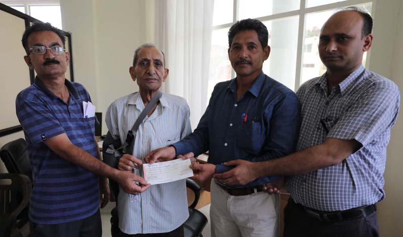 Puran Chand Bargotra being awarded on Sunday. Puran Chand Bargotra being awarded on Sunday.