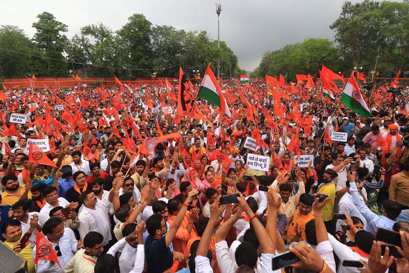 People stage demonstartion during a 'Hanuman Chalisa' called by various Hindu organisations to protest against the murder of tailor Kanhaiya Lal in Udaipur, at Statue Circle , in Jaipur on Sunday. (UNI) People stage demonstartion during a 'Hanuman Chalisa' called by various Hindu organisations to protest against the murder of tailor Kanhaiya Lal in Udaipur, at Statue Circle , in Jaipur on Sunday. (UNI)