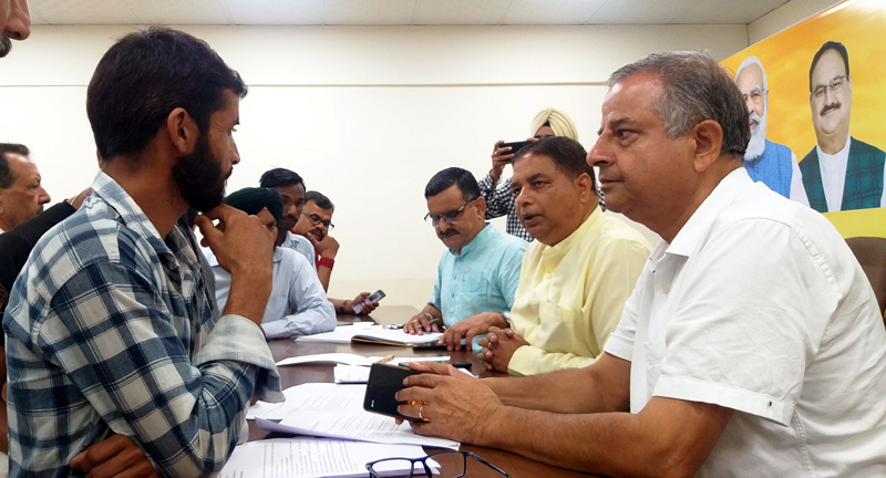 BJP leaders listening public grievances at party office Trikuta Nagar on Wednesday. BJP leaders listening public grievances at party office Trikuta Nagar on Wednesday.