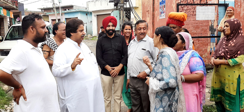 JKPCC working president Raman Bhalla interacting with residents of Rajiv Nagar in Gandhi Nagar constituency of Jammu. JKPCC working president Raman Bhalla interacting with residents of Rajiv Nagar in Gandhi Nagar constituency of Jammu.