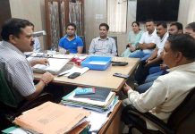 Former BJP president Sat Sharma and other party leaders during a meeting with Chief Engineer , Jal Shakti, Manish Bhat at Jammu on Thursday.