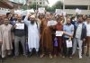 Centaur Hotel employees protesting at Srinagar on Saturday. -Excelsior/Shakeel