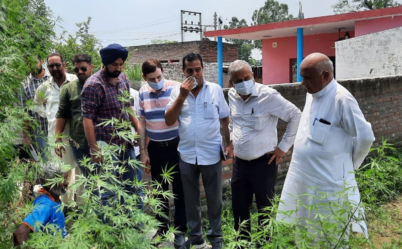 DDC Chairman Bharat Bhushan inspecting damaged drain after inauguratiing road wotk at Jhiri. DDC Chairman Bharat Bhushan inspecting damaged drain after inauguratiing road wotk at Jhiri.