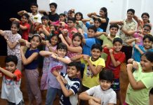 Children undergo training at Natrang Theatre Workshop in Jammu on Sunday.