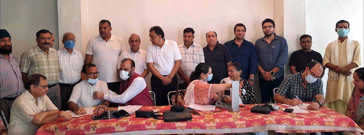 HoD Cardiology Dr Sushil Sharma examining patients at Kunjwani on Sunday. HoD Cardiology Dr Sushil Sharma examining patients at Kunjwani on Sunday.