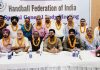 Newly elcted members of Handball Federation of India posing for a group photograph.