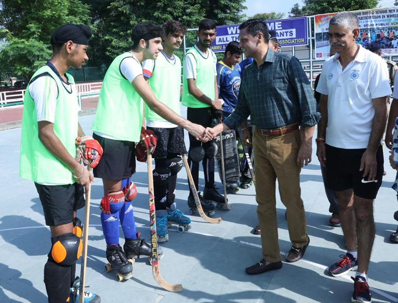 ADGP Mukesh Singh interacting with players at MA Stadium Jammu on Sunday. ADGP Mukesh Singh interacting with players at MA Stadium Jammu on Sunday.