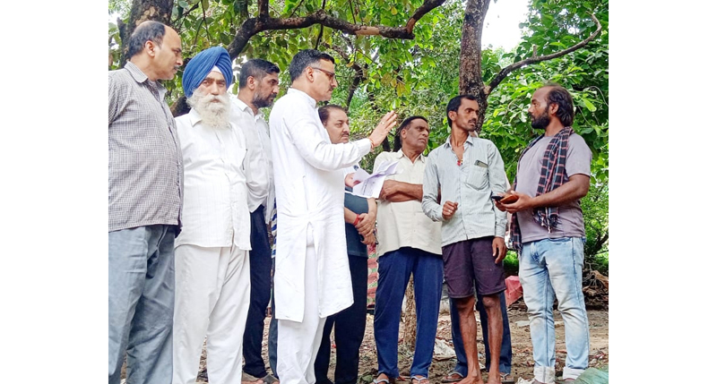 BJP leader and councilor, Sanjay Baru listening to the problems of people in Kabir Nagar on Sunday. BJP leader and councilor, Sanjay Baru listening to the problems of people in Kabir Nagar on Sunday.
