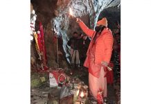 Mahant Deependra Giri Ji performing Puja at holy cave on Friday.