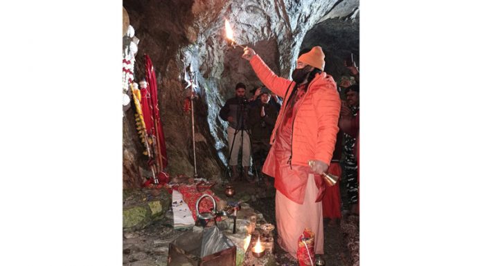 Mahant Deependra Giri Ji performing Puja at holy cave on Friday.