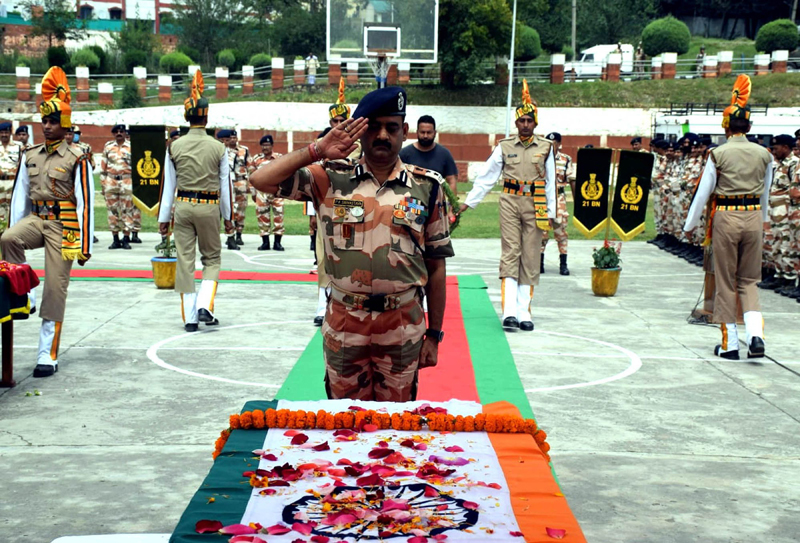 Senior ITBP officers paying rich tribute to ASI Nandan Singh in Srinagar on Tuesday. Senior ITBP officers paying rich tribute to ASI Nandan Singh in Srinagar on Tuesday.