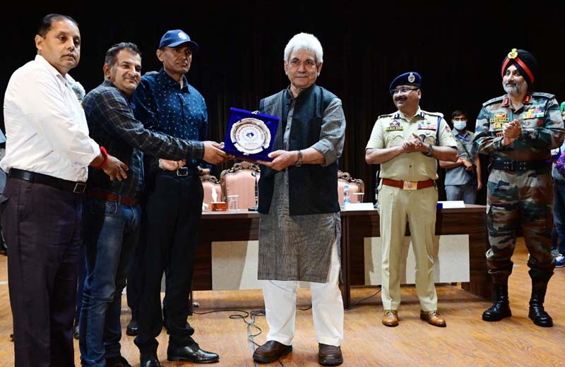 Lieutenant Governor Manoj Sinha felicitating an officer for Shri Amarnath Ji yatra arrangements on Saturday. Lieutenant Governor Manoj Sinha felicitating an officer for Shri Amarnath Ji yatra arrangements on Saturday.