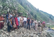 Police and SDRF men engaged in rescue operation near Jawahar Tunnel where cloudburst took place on Wednesday morning. — Excelsior/ Parvaiz Mir