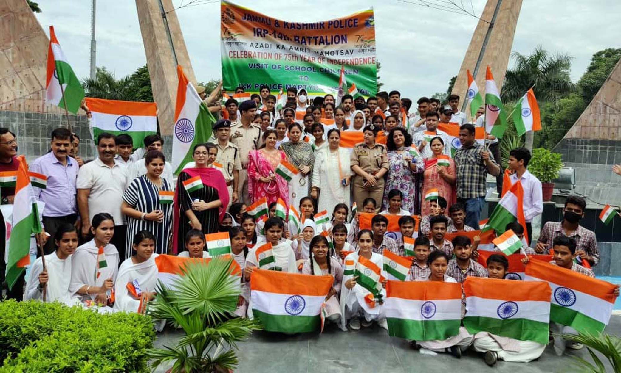 Participants of Tiranga Rally posing for a group photograph at Martyr’s Memorial Rail Head Complex, Jammu on Friday.