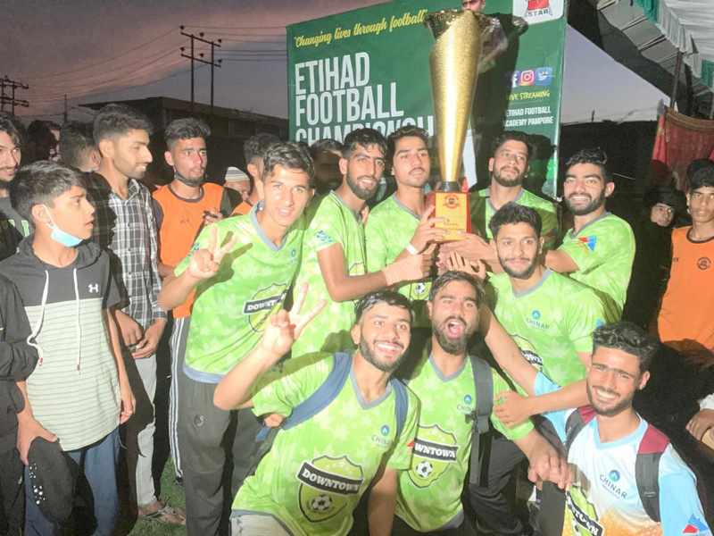 Winning team posing for group photograph. Winning team posing for group photograph.