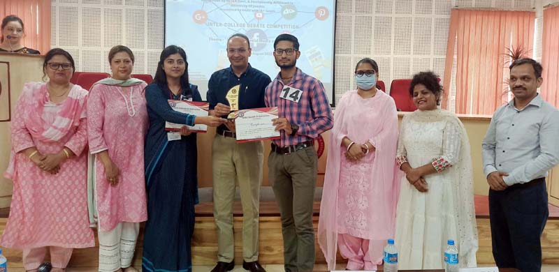 A participant being awarded by dignitaries at MIER College Jammu on Thursday.